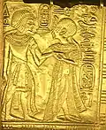 Scene from gilded shrine of Tutankhamen showing him and his wife Queen Ankhesenamun