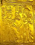 Ankhesenamun offering flowers to Tutankhamun