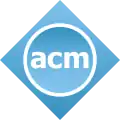 "acm" in blue circle with gray rim, surrounded by blue diamond