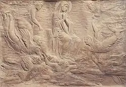 Donatello's rilievo stiacciato or shallow relief of the "Assumption of the Virgin" on a tomb, 1420s