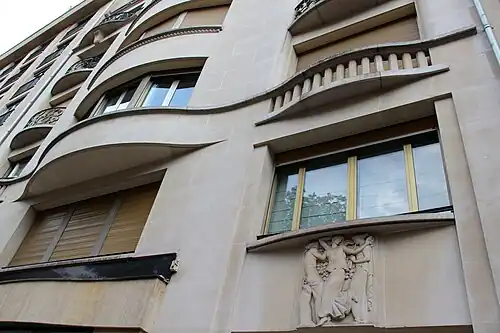Art Nouveau influences – Sinuous curves on the façade of Avenue Montaigne no. 26, Paris, by Louis Duhayon and Marcel Julien (1937)[54]
