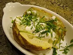 Baked potato with sour cream and chives