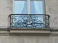 Balcony with elm symbol, overlooking the 'Crossroads of the Elm', Place Saint-Gervais, Paris[95]