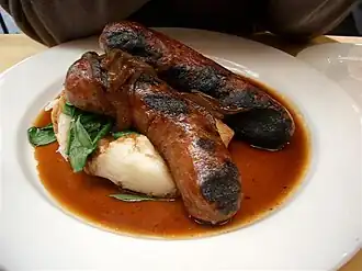 "Bangers and mash": sausages, from Roman times[58][59] and mashed potato (1588–1593)[60]
