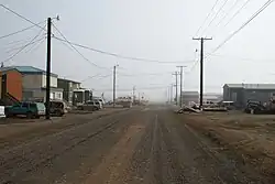 Street view of Utqiagvik in July 2008. Like all the others in Utqiaġvik, this street has been left unpaved due to the prevalence of permafrost.