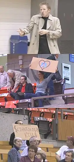 1: A man dressed as Rick Astley dancing. 2: A sports audience member holding a cardboard sign of Rick Astley's face. 3: Another audience member holding a cardboard sign reading, "Scientology kills".