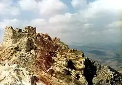 Ruins of a stone castle on a hilltop