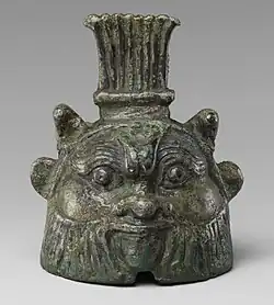 Bell in the form of Bes; 332-30 BC; cupreous metal; height: 6.3&nbsp;cm, diameter: 4.6&nbsp;cm; Metropolitan Museum of Art