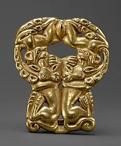 Belt buckle; 3rd-1st centuries BC; gold; height: 7.9&nbsp;cm; Metropolitan Museum of Art[85]