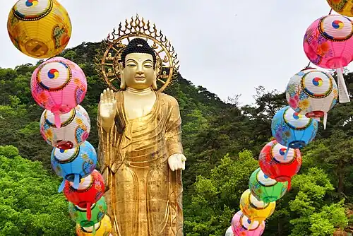 Golden Maitreya Statue rises just over 100 feet or 55 meters in the center of grounds of the temple Beopjusa, built in 1990