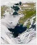 Satellite photo of the Bering Sea – Alaska is on the top right, Siberia on the top left