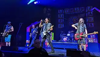 Less Than Jake performing in 2022. From left to right: J.R. Wasilewski, Buddy Schaub, Chris DeMakes, Matt Yonker, Roger Lima.