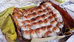 Bibingkoy, grilled glutinous rice dumpling filled with sweetened mung bean paste