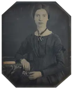 Photograph of Emily Dickinson, seated, at the age of 16