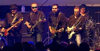 Blue Öyster Cult performing in 2017 (Left to right: Danny Miranda, Eric Bloom, Richie Castellano, Buck Dharma, Jules Radino)