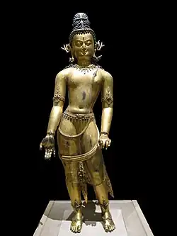 Room 33 – Statue of Bodhisattva Avalokiteshvara, gilded bronze. Nepal, 16th century AD