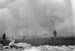 British infantry advancing through gas at Loos, 25 September 1915