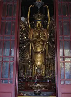 Statue of Qianshou Qianyan Guanyin at the Guanyin dian of Jade Buddha Temple in Shanghai, China.