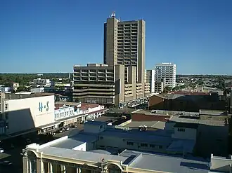 View of Bulawayo's Central Business District (CBD) from Pioneer House by Prince Phumulani Nyoni. The CBD is 5.4 square kilometres and is in a grid pattern with 17 avenues and 11 streets.