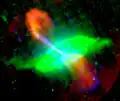 "False-colour image of Centaurus A, showing radio (red), 24-micrometre infrared (green) and 0.5–5 keV X-ray emission (blue)