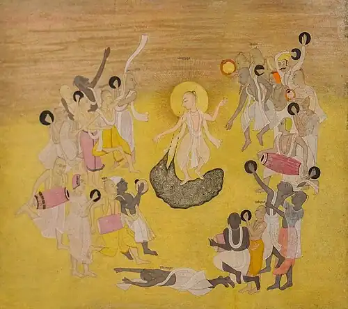 Kisangarh painting of Chaitanya dancing in a puddle of his own tears, surrounded by followers, c. 1750.