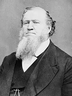 Head shot of Young facing left