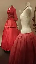 1954 Christian Dior evening gown featuring boned corset bodice.