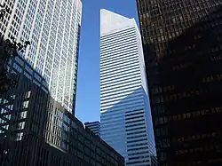 A set of three glass and steel buildings. From left to right are 399 Park Avenue, Citigroup Center, and the Seagram Building.