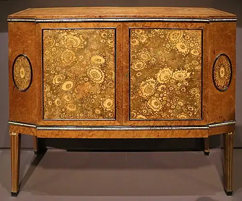 Chest of drawers, a highly simplified reinterpretation of the Louis XVI style; by Clément Mère; 1910; maple, ebony, leather and ivory; 87.5 x 96 x 37&nbsp;cm; Musée d'Orsay, Paris[111]