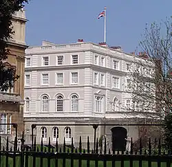 Photograph of Clarence House, a white building with a Union flag flying over it