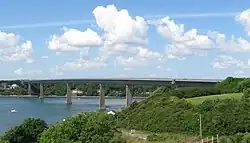 modern bridge spanning a broad river