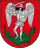 A coat of arms depicting an angel in full body armour and wings outspread while standing on a green dragon with a twisted tail