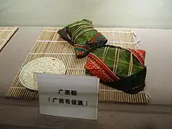 Fancy decorated zongzi in a museum display