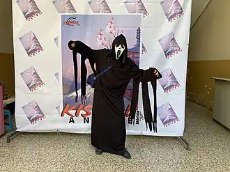 Person wearing a Ghostface costume