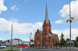Lutheran Church with the Catholic Church of the Immaculate Conception of Blessed Virgin Mary in background