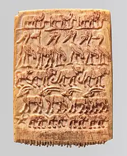 The Davis comb; 3200–3100&nbsp;BC; ivory; 5.5 × 3.9 × 0.5&nbsp;cm; Metropolitan Museum of Art