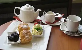 Cream tea: tea (c. 1660),[66] scones (Scots, 16th century),[67] clotted cream, raspberry jam (11th century)[68]