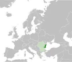 Dobruja (dark green) within Bulgaria and Romania (light green), both in Southeast Europe.