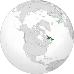 Map of the Dominion of Newfoundland (in dark green) in relation to the United Kingdom (in light green)
