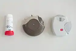 A photograph of three different types of dry powder inhalers