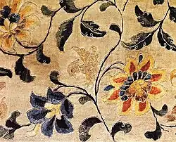 Early Tang embroidery, from Mogao caves.