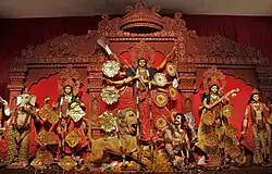Durga Puja is a multi-day festival in Eastern India that features elaborate temple and stage decorations (pandals), scripture recitation, performance arts, revelry, and processions.[72]