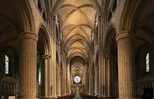 The transition from Romanesque to Gothic styles is visible at the Durham Cathedral in England, (1093–1104). Early Gothic rib vaults are combined with round arches and other Romanesque features.