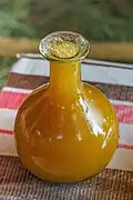 Tej A honey wine, fermented with gesho leaves and twigs, often enjoyed during celebrations.