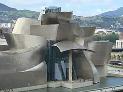 Building made of abstract shapes covered in silvery metal