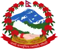 In the background, blue-white snowy himalayas, green forested hills and yellowish fertile plains from top to bottom; in the foreground, two male and female hands joined and a plain white map of Nepal, supported by a wreath of red rhododendrons, seven on each side, with the flag of Nepal at the crest, and at the bottom, the motto of Nepal in Devanagari script