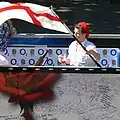 English Rugby team supporter waving the English flag in the streets of Nantes, France in 2007
