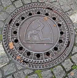 Füssen manhole cover showing coat of arms