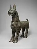 "A demonstration of the excellence achieved in metalwork under the Seljuqs": bronze incense burner shaped like lion, with removable head, dated 1181–82 CE, Taybad, Iran. (Metropolitan Museum of Art)[177][178]