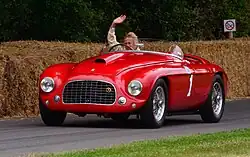 Lady driver and a Ferrari 166 Barchetta